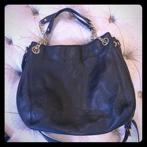 Black leather Michael Kors purse